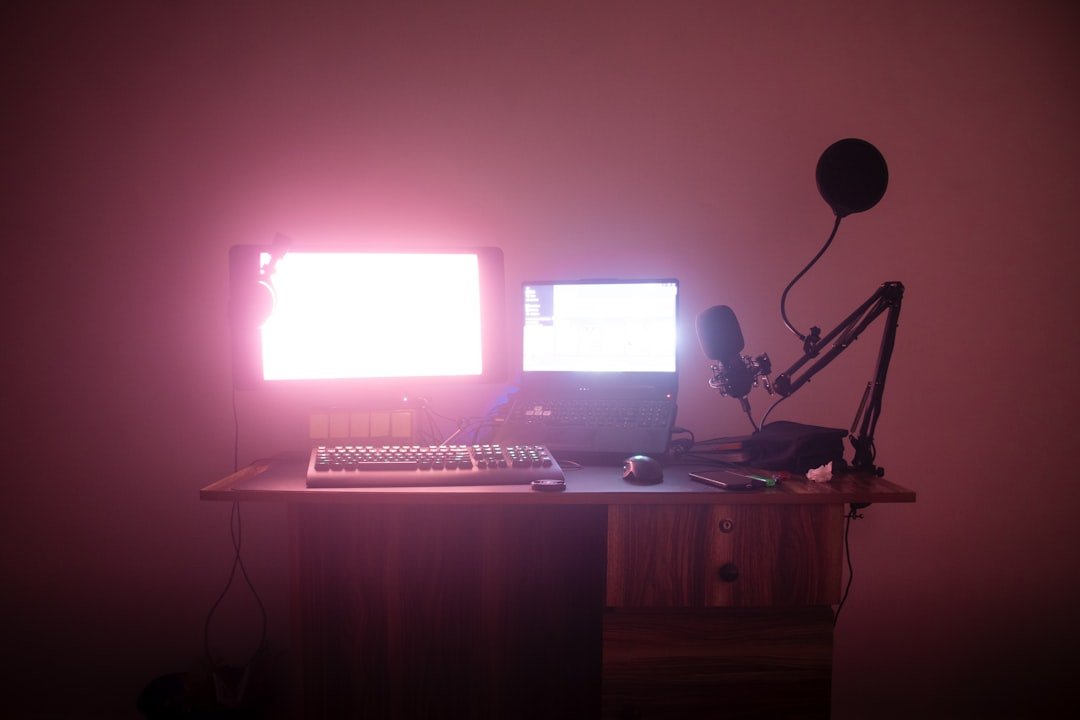 Dual-monitor streaming and editing desk illustrating creator shortcuts and Stream Deck workflow
